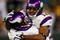 GREEN BAY, WI - NOVEMBER 01: Quarterback Brett Favre #4 of the Minnesota Vikings celebrates with teammate Percy Harvin #12 after a 51 yard touchdown pass during the third quarter of the game against the Green Bay Packers at Lambeau Field on November 1, 2009 in Green Bay, Wisconsin. (Photo by Scott Boehm/Getty Images)