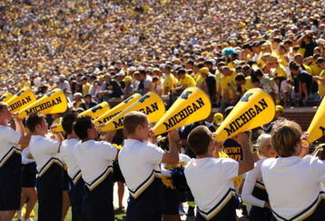 ANN ARBOR, MI - SEPTEMBER 19:  The Michigan Wolverines cheerleaders perform during the game with the Eastern Michigan Eagles at Michigan Stadium on September 19, 2009 in Ann Arbor, Michigan.  Michigan won 45-17.  (Photo by Stephen Dunn/Getty Images)