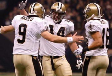NEW ORLEANS - OCTOBER 18:  Drew Brees #9, Heath Evans #44 and Lance Moore #16 of the New Orleans Saints celebrate after scoring a touchdown against the New York Giants at the Louisiana Superdome on October 18, 2009 in New Orleans, Louisiana.  (Photo by Chris Graythen/Getty Images)