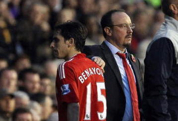 LONDON, ENGLAND - OCTOBER 31:  Rafael Benitez of Liverpool substitutes Yossi Benayoun during the Barclays Premier League match between Fulham and Liverpool at Craven Cottage on October 31, 2009 in London, England.  (Photo by Clive Rose/Getty Images)