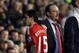 LONDON, ENGLAND - OCTOBER 31:  Rafael Benitez of Liverpool substitutes Yossi Benayoun during the Barclays Premier League match between Fulham and Liverpool at Craven Cottage on October 31, 2009 in London, England.  (Photo by Clive Rose/Getty Images)