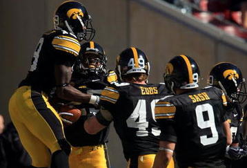 TAMPA, FL - JANUARY 01:   The Iowa Hawkeyes celebrate after an interception by Paki O'Meara #25 against the South Carolina Gamecocks during the Outback Bowl on January 1, 2009 at Raymond James Stadium in Tampa, Florida.  (Photo by Scott Halleran/Getty Images)