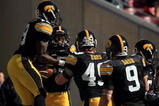 TAMPA, FL - JANUARY 01:   The Iowa Hawkeyes celebrate after an interception by Paki O'Meara #25 against the South Carolina Gamecocks during the Outback Bowl on January 1, 2009 at Raymond James Stadium in Tampa, Florida.  (Photo by Scott Halleran/Getty Images)
