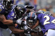 BALTIMORE - NOVEMBER 1:  Brandon Marshall #15 of the Denver Broncos runs the ball against the Baltimore Ravens at M&T Bank Stadium on November 1, 2009 in Baltimore, Maryland. (Photo by Larry French/Getty Images)
