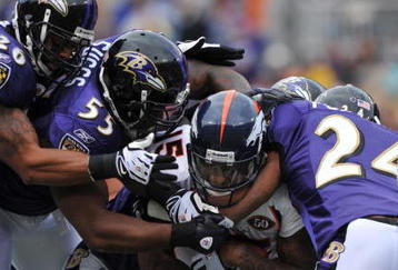 BALTIMORE - NOVEMBER 1:  Brandon Marshall #15 of the Denver Broncos runs the ball against the Baltimore Ravens at M&T Bank Stadium on November 1, 2009 in Baltimore, Maryland. (Photo by Larry French/Getty Images)