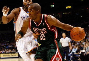 OKLAHOMA CITY - OCTOBER 29:  Michael Redd #22 of the Milwaukee Bucks drives to the basket past Chris Wilcox #54 of the Oklahoma City Thunder at the Ford Center on October 29, 2008 in Oklahoma City, Oklahoma. The Bucks won 98-87.  NOTE TO USER: User expressly acknowledges and agrees that, by downloading and/or using this Photograph, user is consenting to the terms and conditions of the Getty Images License Agreement.  (Photo by Chris Graythen/Getty Images)
