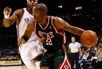 OKLAHOMA CITY - OCTOBER 29:  Michael Redd #22 of the Milwaukee Bucks drives to the basket past Chris Wilcox #54 of the Oklahoma City Thunder at the Ford Center on October 29, 2008 in Oklahoma City, Oklahoma. The Bucks won 98-87.  NOTE TO USER: User expressly acknowledges and agrees that, by downloading and/or using this Photograph, user is consenting to the terms and conditions of the Getty Images License Agreement.  (Photo by Chris Graythen/Getty Images)