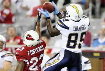 GLENDALE, AZ - AUGUST 22:  Wide Receiver Chris Chambers #89 of the San Diego Chargers makes a leaping catch against Corner back Wilrey Fontenot #23 OF the Arizona Cardinals at the University of Phoenix Stadium on August 22, 2009 in Glendale, Arizona. (Photo by Christian Petersen/Getty Images)