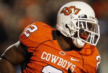 STILLWATER, OK - OCTOBER 31:  Running back Beau Johnson #2 of the Oklahoma State Cowboys celebrates his touchdown in the second quarter of the game against the Texas Longhorns at Boone Pickens Stadium on October 31, 2009 in Stillwater, Oklahoma.  (Photo by Ronald Martinez/Getty Images)