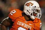 STILLWATER, OK - OCTOBER 31:  Running back Beau Johnson #2 of the Oklahoma State Cowboys celebrates his touchdown in the second quarter of the game against the Texas Longhorns at Boone Pickens Stadium on October 31, 2009 in Stillwater, Oklahoma.  (Photo by Ronald Martinez/Getty Images)