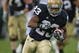 SOUTH BEND, IN - OCTOBER 03: Golden Tate #23 of the Notre Dame Fighting Irish runs against the Washington Huskies on his way to a 67 yard touchdown on October 3, 2009 at Notre Dame Stadium in South Bend, Indiana. (Photo by Jonathan Daniel/Getty Images)