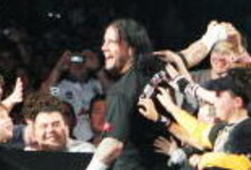 SYDNEY, AUSTRALIA - JUNE 15:  CM Punk celebrates with fans before facing Shelton Benjamin during WWE Smackdown at Acer Arena on June 15, 2008 in Sydney, Australia.  (Photo by Gaye Gerard/Getty Images)