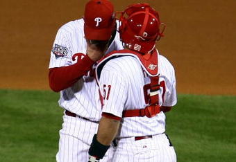 PHILADELPHIA - NOVEMBER 01:  (L-R) Brad Lidge #54 and Carlos Ruiz #51 of the Philadelphia Phillies talk on the mound in the top of the ninth inning against the New York Yankees in Game Four of the 2009 MLB World Series at Citizens Bank Park on November 1, 2009 in Philadelphia, Pennsylvania.  (Photo by Chris McGrath/Getty Images)