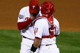 PHILADELPHIA - NOVEMBER 01:  (L-R) Brad Lidge #54 and Carlos Ruiz #51 of the Philadelphia Phillies talk on the mound in the top of the ninth inning against the New York Yankees in Game Four of the 2009 MLB World Series at Citizens Bank Park on November 1, 2009 in Philadelphia, Pennsylvania.  (Photo by Chris McGrath/Getty Images)