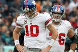 PHILADELPHIA - NOVEMBER 01:  Eli Manning #10 and Chris Snee #76 of the New York Giants stand on the field against the Philadelphia Eagles on November 1, 2009 at Lincoln Financial Field in Philadelphia, Pennsylvania.  (Photo by Jim McIsaac/Getty Images)