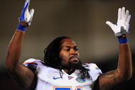 STARKVILLE, MS - OCTOBER 24: Linebacker Brandon Spikes # 51 of the Florida Gators signals a touchdown against the Mississippi Bulldogs, at Davis Wade Stadium on October 24, 2009 in Starkville, Mississippi (Photo by Rick Dole/Getty Images)
