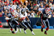 ORCHARD PARK, NY - NOVEMBER 01:  Ryan Moats #21 of the Houston Texans runs ahead of Paul Posluszny #51 and Aaron Schobel #94 of  the Buffalo Bills at Ralph Wilson Stadium on November 1, 2009 in Orchard Park, New York. Houston won 31-10.  (Photo by Rick Stewart/Getty Images)