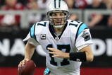 GLENDALE, AZ - NOVEMBER 01:  Quarterback Jake Delhomme #17 of the Carolina Panthers scrambles with the ball during the NFL game against the Arizona Cardinals at the Universtity of Phoenix Stadium on November 1, 2009 in Glendale, Arizona. The Panthers defeated the Cardinals 34-21.  (Photo by Christian Petersen/Getty Images)