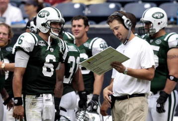 HOUSTON - SEPTEMBER 13:  Quarterback Mark Sanchez #6 of the New York Jets talks with offensive coordinator Brian Schottenheimer at Reliant Stadium on September 13, 2009 in Houston, Texas.  (Photo by Bob Levey/Getty Images)