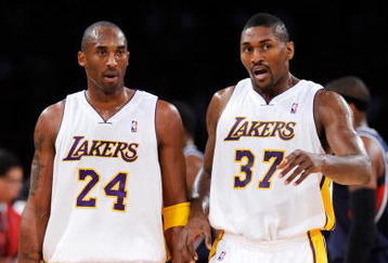 LOS ANGELES, CA - NOVEMBER 01:  Kobe Bryant #24 and Ron Artest of the Los Angeles Lakers talk against the Atlanta Hawks during the second quarter of the NBA basketball game at Staples Center on November 1, 2009 in Los Angeles, California. Bryant scored 41 points and the Lakers went on to win 118-110. NOTE TO USER: User expressly acknowledges and agrees that, by downloading and/or using this Photograph, user is consenting to the terms and conditions of the Getty Images License Agreement.  (Photo by Kevork Djansezian/Getty Images)