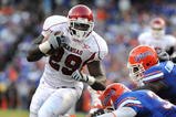 GAINESVILLE, FL - OCTOBER 17: Running back Broderick Green #29  of the Arkansas Razorbacks rushes upfield against the Florida Gators October 17, 2009 at Ben Hill Griffin Stadium in Gainesville, Florida.  (Photo by Al Messerschmidt/Getty Images)