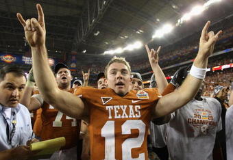GLENDALE, AZ - JANUARY 05:  Quarterback Colt McCoy #12 of the Texas Longhorns celebrates after defeating the Ohio State Buckeyes in the Tostitos Fiesta Bowl Game on January 5, 2009 at University of Phoenix Stadium in Glendale, Arizona. The Longhorns defeated the Buckeyes 24-21  (Photo by Jed Jacobsohn/Getty Images)