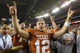 GLENDALE, AZ - JANUARY 05:  Quarterback Colt McCoy #12 of the Texas Longhorns celebrates after defeating the Ohio State Buckeyes in the Tostitos Fiesta Bowl Game on January 5, 2009 at University of Phoenix Stadium in Glendale, Arizona. The Longhorns defeated the Buckeyes 24-21  (Photo by Jed Jacobsohn/Getty Images)