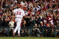 PHILADELPHIA - NOVEMBER 02: Cliff Lee #34 of the Philadelphia Phillies runs back to the dugout after the final out in the top of the seventh inning against the New York Yankees in Game Five of the 2009 MLB World Series at Citizens Bank Park on November 2, 2009 in Philadelphia, Pennsylvania. (Photo by Nick Laham/Getty Images)