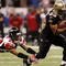 NEW ORLEANS - NOVEMBER 2:  Pierre Thomas #23 of the New Orleans Saints out runs Thomas DeCoud #28 of the Atlanta Falcons during the game at the Louisiana Superdome on November 2, 2009 in New Orleans, Louisiana. (Photo by Chris Graythen/Getty Images)