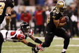 NEW ORLEANS - NOVEMBER 2:  Pierre Thomas #23 of the New Orleans Saints out runs Thomas DeCoud #28 of the Atlanta Falcons during the game at the Louisiana Superdome on November 2, 2009 in New Orleans, Louisiana. (Photo by Chris Graythen/Getty Images)