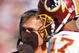 LANDOVER, MD - OCTOBER 4: Head coach Jim Zorn speaks with Jason Campbell #17 of the Washington Redskins during a time out against the Tampa Bay Buccaneers at FedExField on October 4, 2009 in Landover, Maryland. The Redskins defeated the Buccaneers 16-13. (Photo by Larry French/Getty Images)