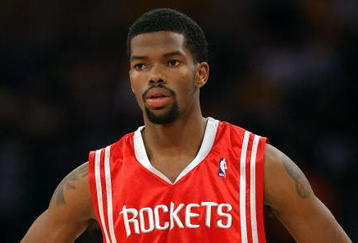 LOS ANGELES, CA - MAY 12:  Aaron Brooks #0 of the Houston Rockets looks on against the Los Angeles Lakers in Game Five of the Western Conference Semifinals during the 2009 NBA Playoffs at Staples Center on May 12, 2009 in Los Angeles, California. NOTE TO USER: User expressly acknowledges and agrees that, by downloading and or using this photograph, User is consenting to the terms and conditions of the Getty Images License Agreement.  (Photo by Stephen Dunn/Getty Images)