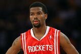 LOS ANGELES, CA - MAY 12:  Aaron Brooks #0 of the Houston Rockets looks on against the Los Angeles Lakers in Game Five of the Western Conference Semifinals during the 2009 NBA Playoffs at Staples Center on May 12, 2009 in Los Angeles, California. NOTE TO USER: User expressly acknowledges and agrees that, by downloading and or using this photograph, User is consenting to the terms and conditions of the Getty Images License Agreement.  (Photo by Stephen Dunn/Getty Images)