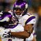 GREEN BAY, WI - NOVEMBER 01: Quarterback Brett Favre #4 of the Minnesota Vikings celebrates with teammate Percy Harvin #12 after a 51 yard touchdown pass during the third quarter of the game against the Green Bay Packers at Lambeau Field on November 1, 2009 in Green Bay, Wisconsin. (Photo by Scott Boehm/Getty Images)