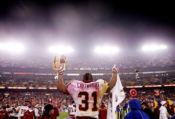 LANDOVER, MD - DECEMBER 30:  Rock Cartwright #31 of the Washington Redskins celebrates the win against the Dallas Cowboys on December 30, 2007 at FedEx Field in Landover, Maryland.  (Photo by Nick Laham/Getty Images)  