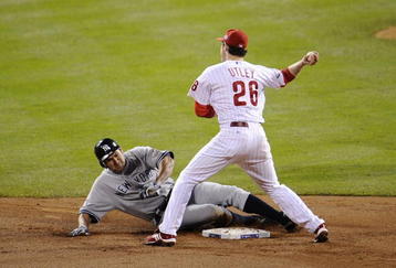 PHILADELPHIA - NOVEMBER 02:  Second baseman Chase Utley #26 of the Philadelphia Phillies attempts to turn a double-play in the top of the third inning as Johnny Damon #18 of the New York Yankees is out at second base on a fielder's choice in Game Five of the 2009 MLB World Series at Citizens Bank Park on November 2, 2009 in Philadelphia, Pennsylvania. (Photo by Jeff Zelevansky/Getty Images)