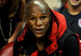 LAS VEGAS - OCTOBER 15:  Boxer Floyd Mayweather Jr. watches the preseason game between the Los Angeles Lakers and the Sacramento Kings at the Thomas & Mack Center October 15, 2009 in Las Vegas, Nevada. NOTE TO USER: User expressly acknowledges and agrees that, by downloading and/or using this Photograph, user is consenting to the terms and conditions of the Getty Images License Agreement.  (Photo by Ethan Miller/Getty Images)