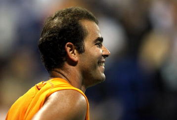 LOS ANGELES, CA - JULY 27:  Tournament honoree Pete Sampras smiles while taking on Marat Safin in the Millennium Challenge during the LA Tennis Open Day 1 at Los Angeles Tennis Center - UCLA on July 27, 2009 in Los Angeles, California.  Safin defeated Sampras 6-4, 3-6, 1-0.  (Photo by Stephen Dunn/Getty Images)