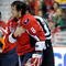 WASHINGTON - NOVEMBER 01:  Alex Ovechkin #8 of the Washington Capitals holds his shoulder as he is escorted to the penalty box after receiving a roughing penalty in the second period against the Columbus Blue Jackets at the Verizon Center on November 1, 2009 in Washington, DC.  (Photo by Greg Fiume/Getty Images)