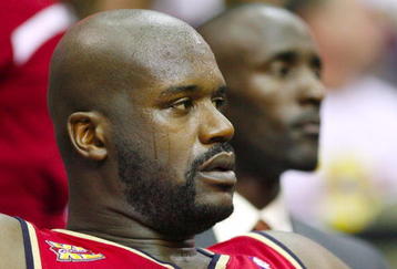 CLEVELAND - OCTOBER 27:  Shaquille O'Neal #33 of the Cleveland Cavaliers rests on the bench during the season opener against the Boston Celtics at Quicken Loans Arena on October 27, 2009 in Cleveland, Ohio.  NOTE TO USER: User expressly acknowledges and agrees that, by downloading and or using this photograph, User is consenting to the terms and conditions of the Getty Images License Agreement. (Photo by Gregory Shamus/Getty Images)