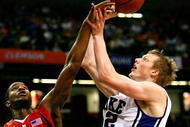 ATLANTA - MARCH 14:  Dino Gregory #33 defends as Landon Milbourne #1 of the Maryland Terrapins blocks a shot by Kyle Singler #12 of the Duke Blue Devils during the semifinals of the 2009 ACC Men's Basketball Tournament on March 14, 2009 at the Georgia Dome in Atlanta, Georgia.  (Photo by Kevin C. Cox/Getty Images)