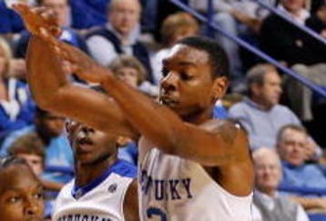 LEXINGTON, KY - NOVEMBER 02:  Darnell Dodson #3 of the Kentucky Wildcats defends Jermaine Carter #13 of the Campbellsville University Tigers during the game at Rupp Arena on November 2, 2009 in Lexington, Kentucky.  (Photo by Andy Lyons/Getty Images)