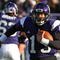 EVANSTON, IL - OCTOBER 31: Mike Kafka #13 of the Northwestern Wildcats runs for a first down against the Penn State Nittany Lions at Ryan Field on October 31, 2009 in Evanston, Illinois. (Photo by Jonathan Daniel/Getty Images)