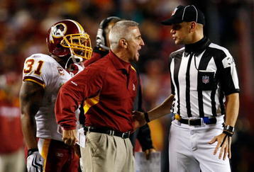 LANDOVER, MD - OCTOBER 26:  Special teams coach Danny Smith of the Washington Redskins argues with a referee during the game against the Philadelphia Eagles at FedEx Field October 26, 2009 in Landover, Maryland. The Eagles won the game 27-17.  (Photo by Win McNamee/Getty Images)