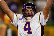 GREEN BAY, WI - NOVEMBER 01: Quarterback Brett Favre #4 of the Minnesota Vikings celebrates a touchdown by teammate Percy Harvin #12 after a 51 yard touchdown pass during the third quarter of the game against the Green Bay Packers at Lambeau Field on November 1, 2009 in Green Bay, Wisconsin. (Photo by Scott Boehm/Getty Images)
