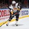 UNIONDALE, NY - OCTOBER 31:  Mike Grier #25 of the Buffalo Sabres skates against the New York Islanders on October 31, 2009 at Nassau Coliseum in Uniondale, New York. The Isles defeated the Sabres 5-0.  (Photo by Jim McIsaac/Getty Images)