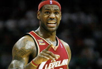 CLEVELAND - OCTOBER 27:  LeBron James #23 of the Cleveland Cavaliers reacts during the season opener against the Boston Celtics at Quicken Loans Arena on October 27, 2009 in Cleveland, Ohio.  NOTE TO USER: User expressly acknowledges and agrees that, by downloading and or using this photograph, User is consenting to the terms and conditions of the Getty Images License Agreement. (Photo by Gregory Shamus/Getty Images)