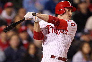 PHILADELPHIA - NOVEMBER 02:  Chase Utley #26 of the Philadelphia Phillies hits a 3-run home run in the bottom of the first inning against the New York Yankees in Game Five of the 2009 MLB World Series at Citizens Bank Park on November 2, 2009 in Philadelphia, Pennsylvania.  (Photo by Jed Jacobsohn/Getty Images)