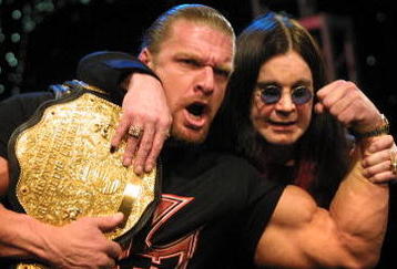 Ozzy Osbourne with WWF wrestler Triple H during a press conference to announce the Ozzfest 2002 line-up and partnership with the WWF at the WWF/World Theater in Times Square in New York City.  3/21/02  Photo by Scott Gries/ImageDirect