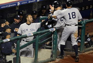 PHILADELPHIA - NOVEMBER 02:  Derek Jeter #2 of the New York Yankees congratulates Mark Teixeira #25 and Johnny Damon #18 as they return to the dugout after they scored on a 2-run double by Alex Rodriguez #13 in the top of the eighth inning against the Philadelphia Phillies in Game Five of the 2009 MLB World Series at Citizens Bank Park on November 2, 2009 in Philadelphia, Pennsylvania.  (Photo by Al Bello/Getty Images)
